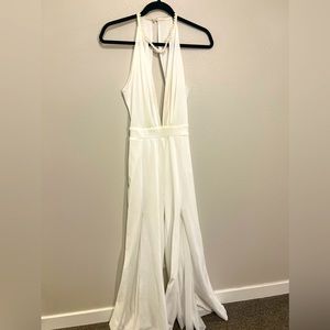 White jumper with embroidery and open pleated legs